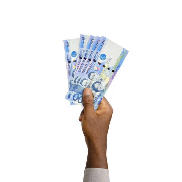 Black Hand holding 3D rendered 1000 Philippines peso notes isolated on white background