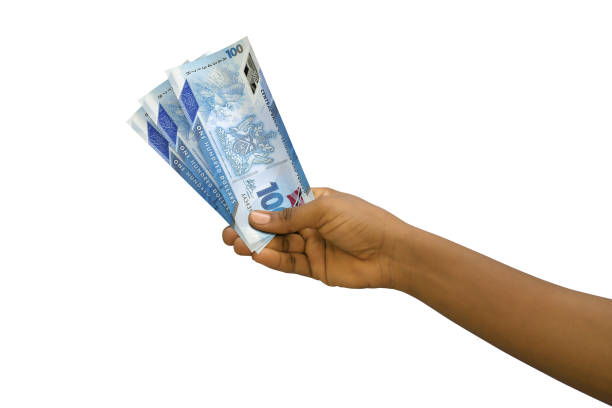 istock Fair hand holding 3D rendered 1000 Philippines peso notes isolated on white background 1370206925