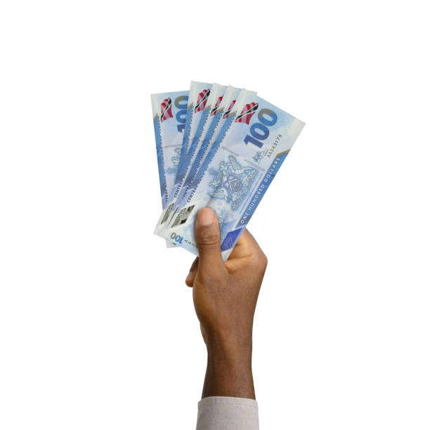 istock Black Hand holding 3D rendered 1000 Philippines peso notes isolated on white background 1370207438
