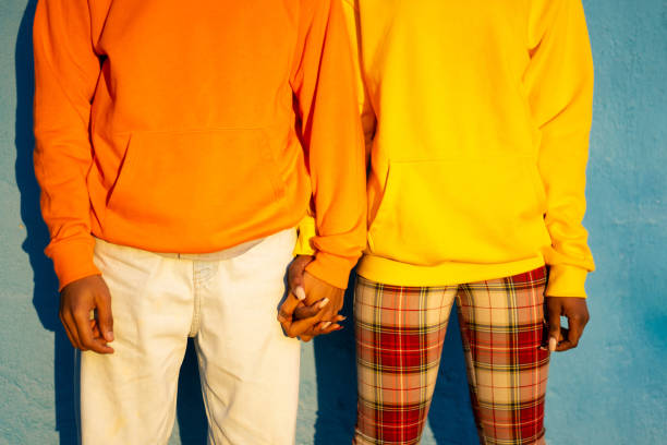 istock Man and woman holding hands mid section only 1370212128