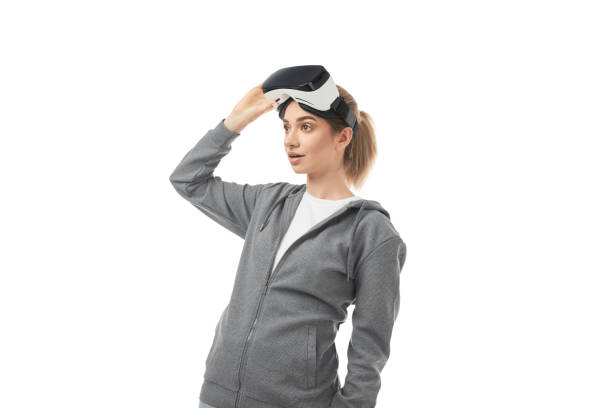 istock Young woman with VR headset 1370212189