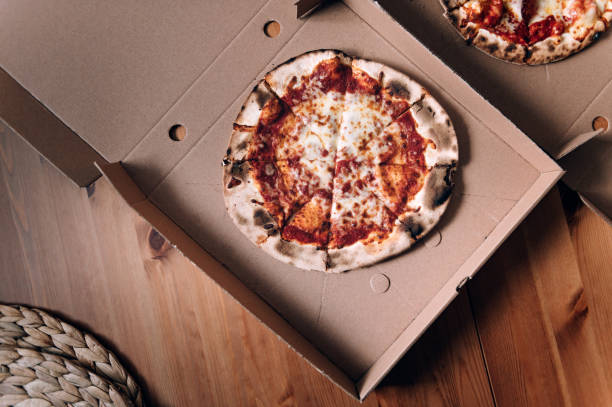 istock Margherita pizza in the box 1370212334