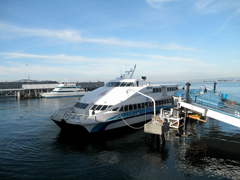 San Francisco - January 24, 2011:  Aerial of Ferry boat docking at port during the day.