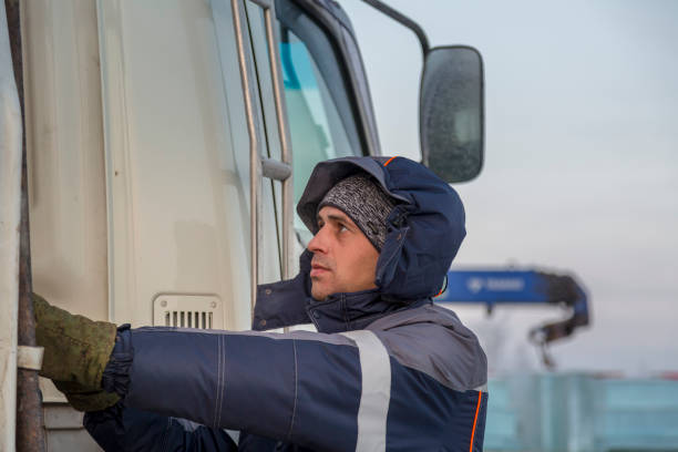 istock Portrait of a hydraulic crane operating worker 1370214603