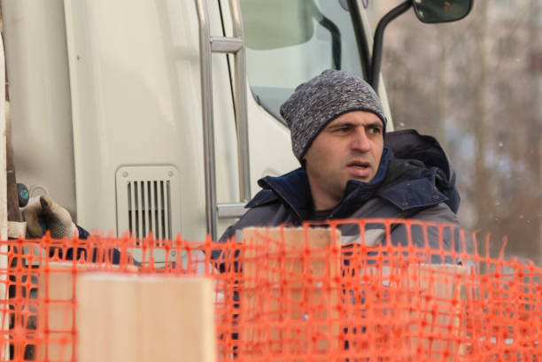 istock Portrait of a hydraulic crane operating worker 1370214648
