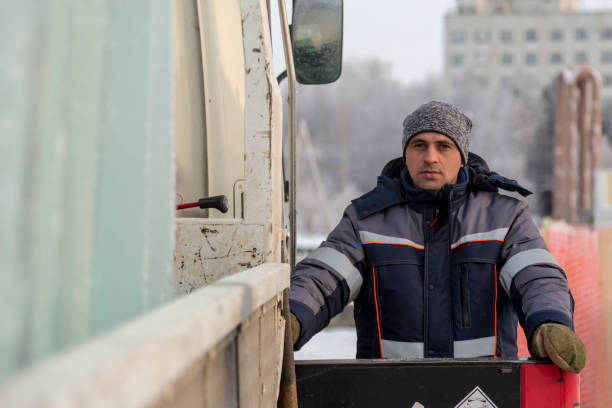istock Portrait of a hydraulic crane operating worker 1370214655
