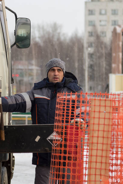 istock Portrait of a hydraulic crane operating worker 1370214659