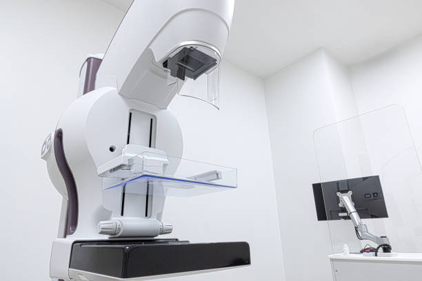 istock A mammogram machine with a computer work station in the radiology department. 1370223488