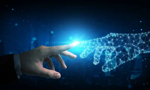 Photo of Hand of businessman touching hand artificial intelligence meaning technology connection go to future