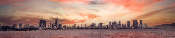 Mumbai city scape Panoramic view of Mumbai city scape in colourful sky mumbai stock pictures, royalty-free photos & images
