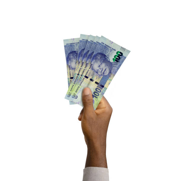 istock Black Hand holding 3D rendered South African rand notes 1370234484
