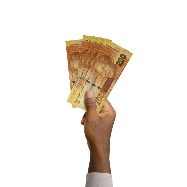 istock Black Hand holding 3D rendered 200 South African rand notes 1370234504