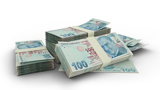 Pila 3D de billetes de 100 liras turcas aislados sobre fondo blanco photo