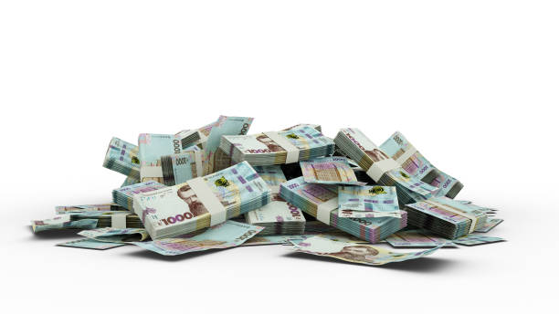istock 3D Stack of Ukrainian hryvnia notes isolated on white background. 1370236012