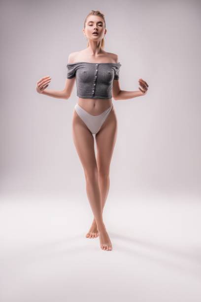istock Slim sexy woman in studio 1370239857