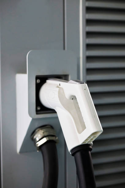 istock charging gun for electric car 1370241418