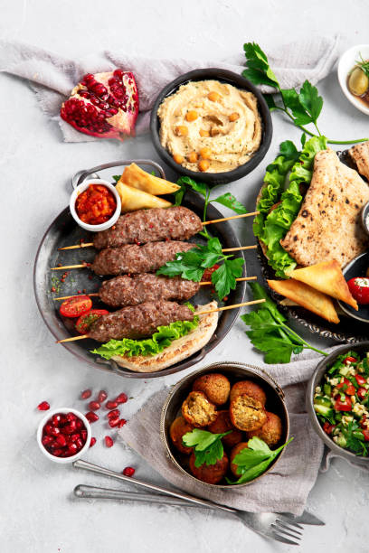 istock Lebanese food assortment on light background. 1370242080