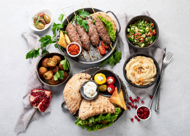istock Lebanese food assortment on light background. 1370242139