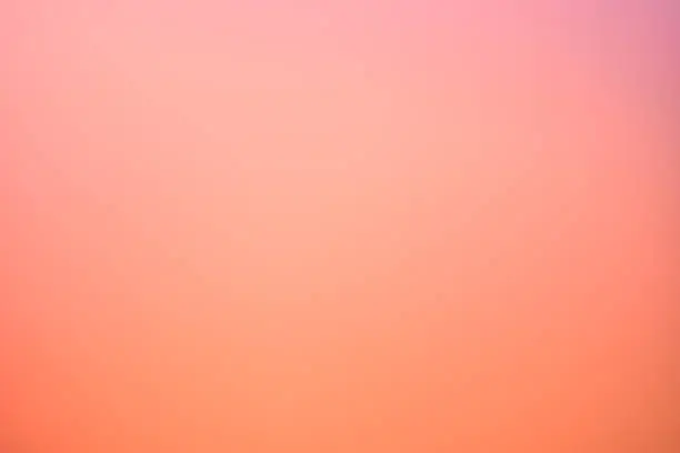 Photo of Soft pink to orange gradient background