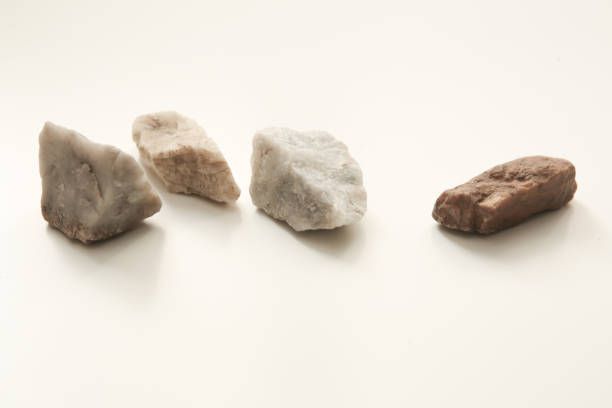 Natural minerals of rocks close-up on a light background, light soft focus background