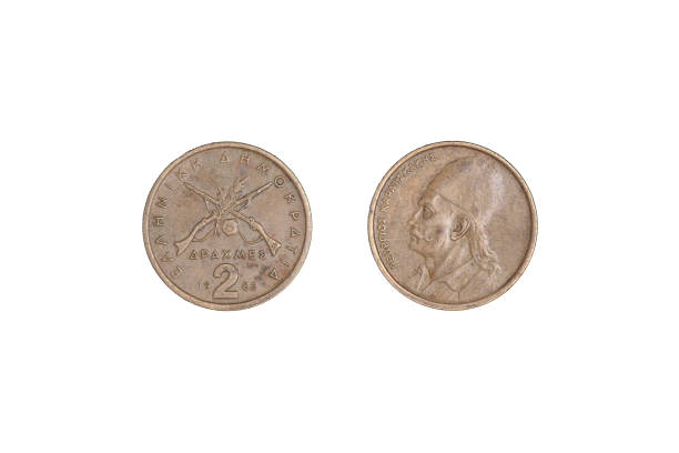 istock 2 drachmes 1982 coin isolated on black background, Greece. both sides close-up 1370247483