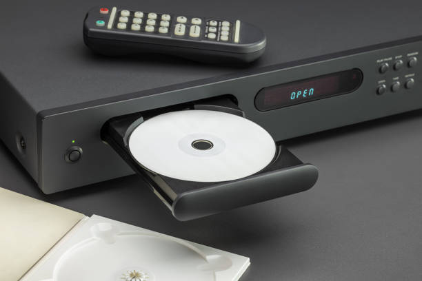 istock Control panel on the lid of the CD player, open disc tray, close-up. 1370247627