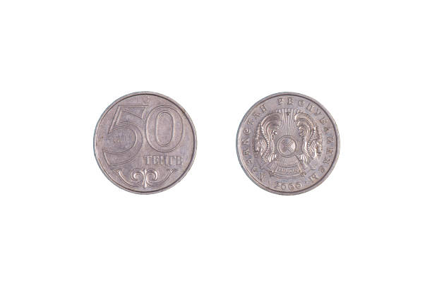 istock 50 tenge Kazakhstan 2000 year. Isolated object on a black background. Close-up on both sides 1370248357