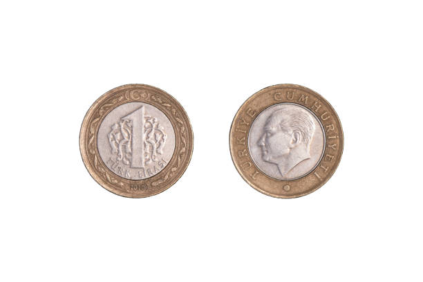istock Turkish One Lira Coins Isolated On black. close-up. 1370248550