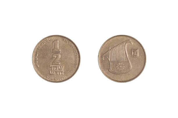 istock half Israeli new sheqel from both sides on a black background. Close-up 1370248655