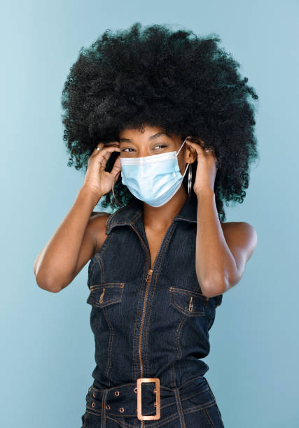 istock Ethnic woman in protective mask 1370250466
