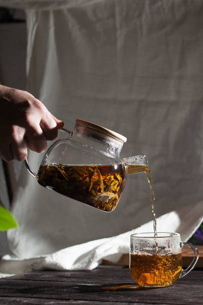 istock Transparent teapot with hot Koporye tea, traditional Russian drink 1370253947