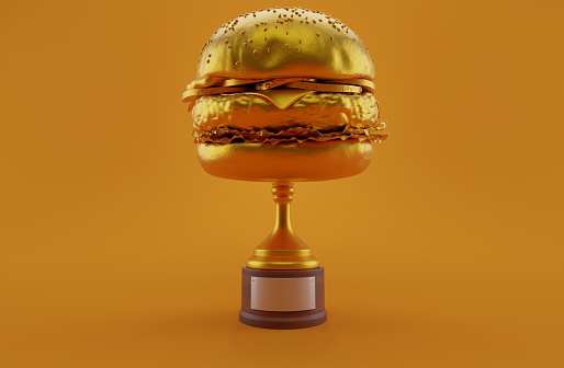 Cheeseburger golden trophy on orange background. 3d illustration