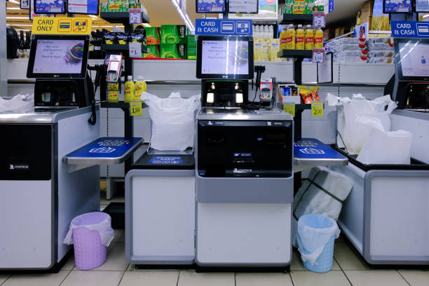 Self check out, automated touchscreen payment stations at NTUC Fairprice supermarket. Singapore Jun23 2020 Self check out, automated touchscreen payment stations at NTUC Fairprice supermarket. contactless airport stock pictures, royalty-free photos & images