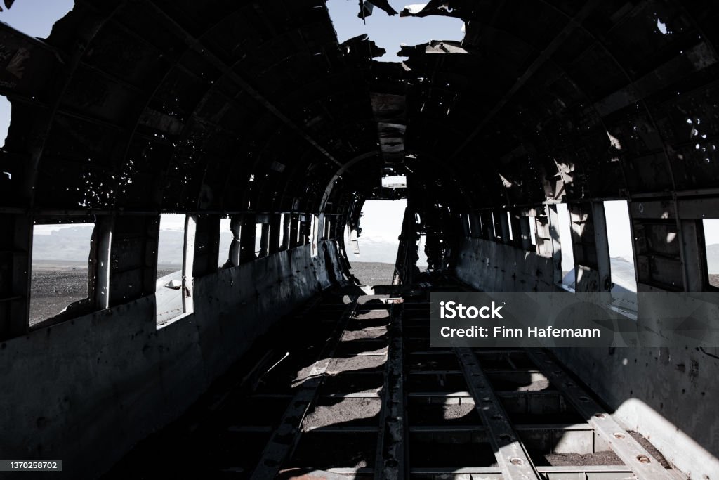 Inside DC-3 Airplane Wreck Solheimasandur Iceland Interior view of DC-3 Airplane wreck in Solheimasandur, Iceland. Air Vehicle Stock Photo