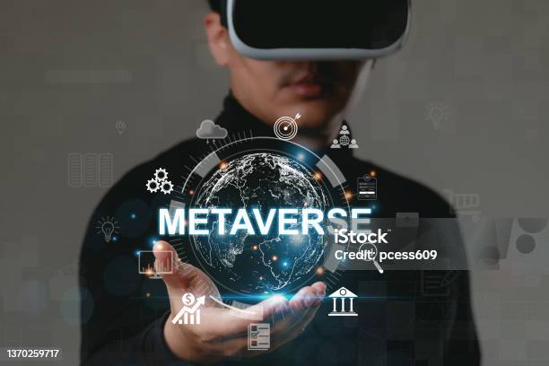 Man Wearing Vr Glasses Shows The Future World Of The Metaverse Global Business Digital Marketing Metaverse Digital Link Tech Future Technology Metaverse World Virtual Reality Technology Concept Stock Photo - Download Image Now