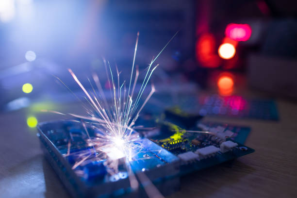 istock Microcircuit for TFT with wires sparkles with electric sparks 1370263914