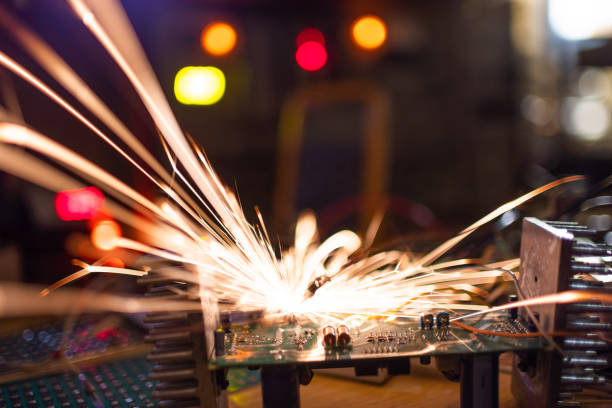 istock Microcircuit for TFT with wires sparkles with electric sparks 1370263939