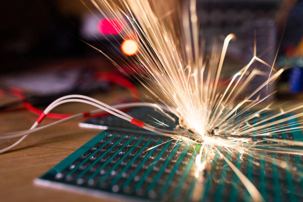 istock Microcircuit for TFT with wires sparkles with electric sparks 1370263964