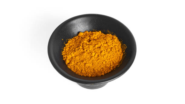 istock Turmeric powder isolated on a white background. Spices 1370264741