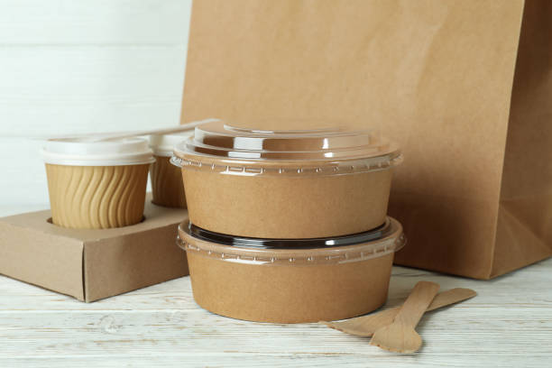 istock Delivery containers for takeaway food on white wooden table 1370264991