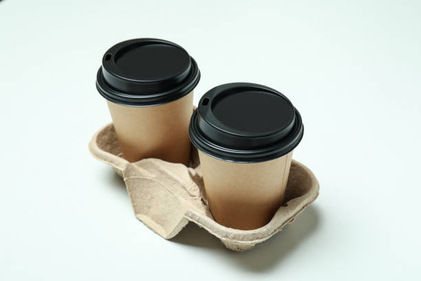 istock Cup holder with paper cups on white background 1370265016