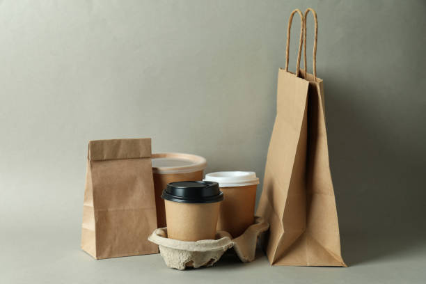 istock Delivery containers for takeaway food on gray background 1370265096