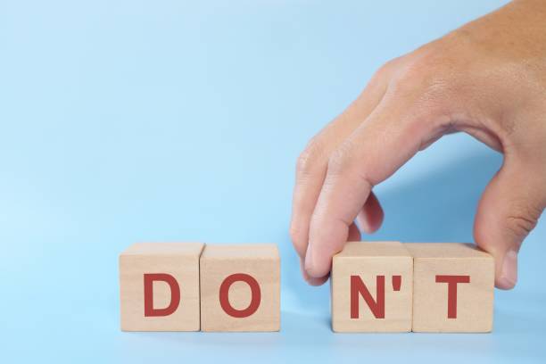 istock Self motivation and positive thinking concept. Hand changing wooden blocks letters from don't to do. 1370266108