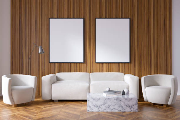 istock Bright living room interior with two empty white posters, sofa 1370268360