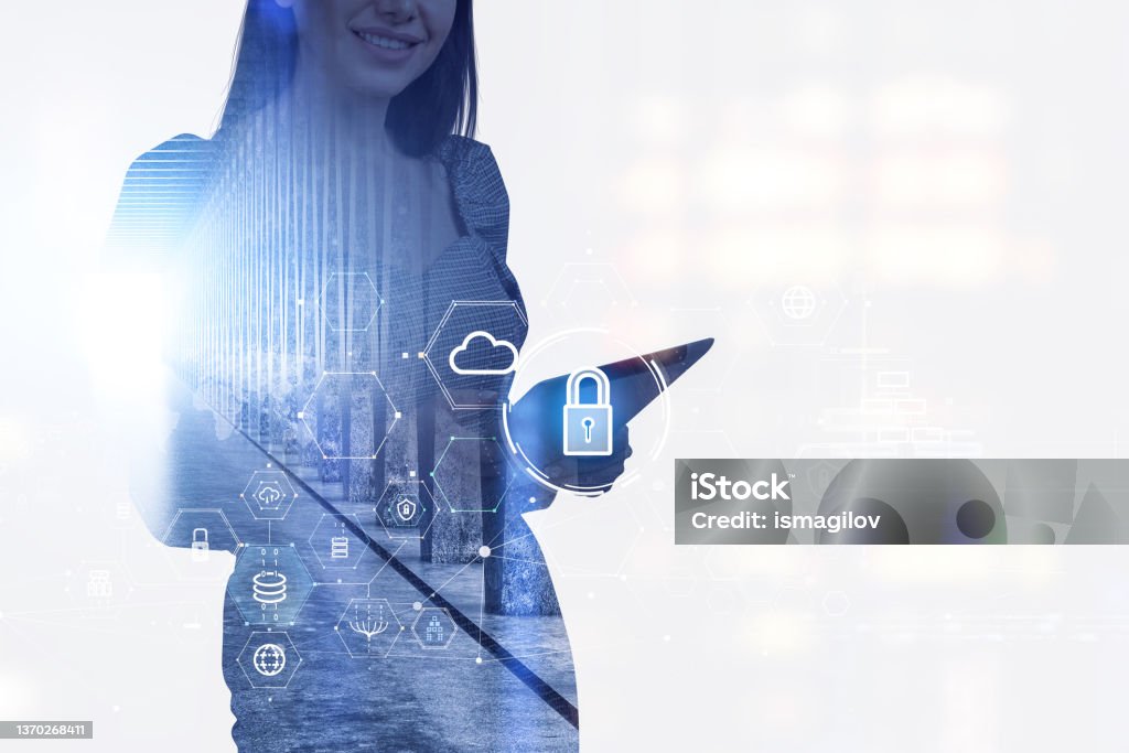 Smiling businesswoman wearing formal dress is holding tablet dev Smiling businesswoman wearing formal dress is holding tablet device. Hud with padlock, information security, cloud data storage in the background. Concept of imagination and inspiration Secretary Stock Photo