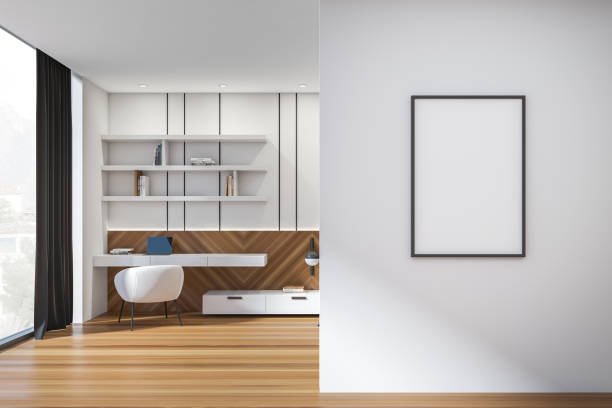 istock Workplace interior with table and armchair near window. Mockup poster 1370268739