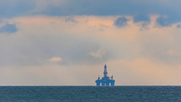 istock Deepwater oil platform on the horizon at sea 1370273532