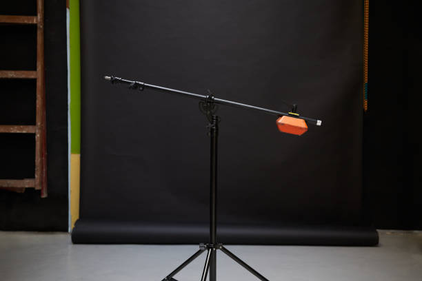 istock Tripod with counterweight on black background 1370275927