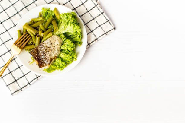 istock hake and green beans. healthy dinner on a diet 1370278202