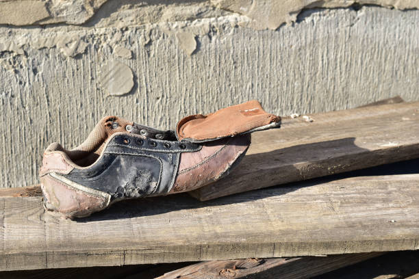 istock A torn shoe lies on the boards. 1370278640